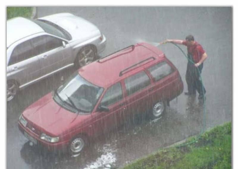 Washing car in rain.JPG